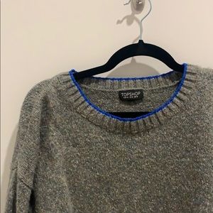 Grey sweater with blue trim
